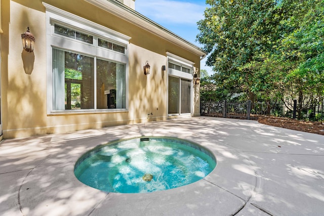 2928 Pine Valley Dr, Miramar Beach, FL 32550 - view of pool with a patio, an in ground hot tub, and fence