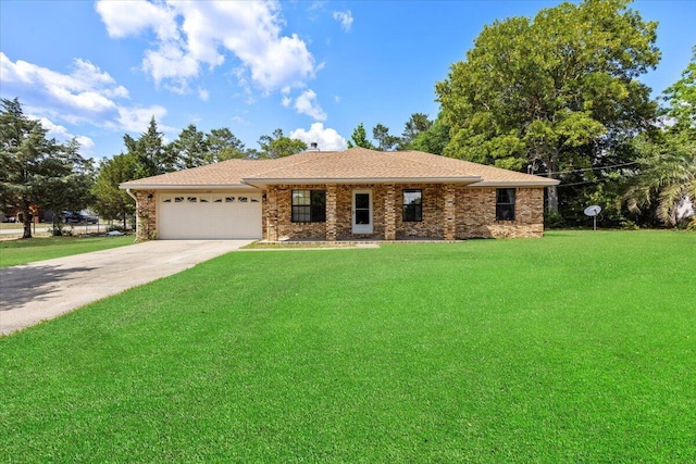 612 Moss Dr, Crestview, FL 32536 - single story home with an attached garage, driveway, and a front lawn