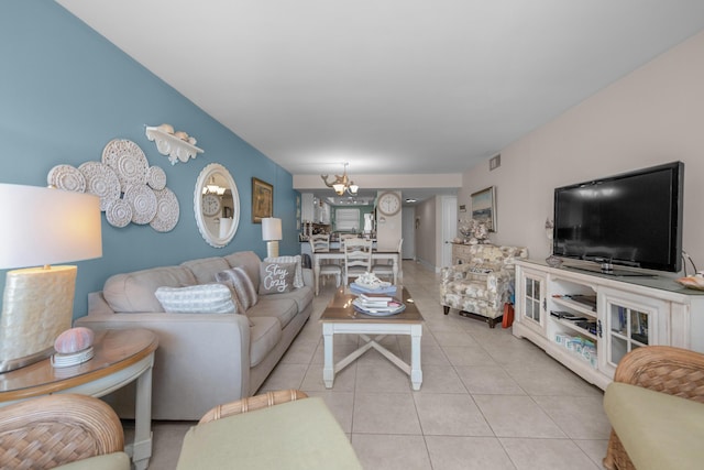 909 Santa Rosa Blvd Unit 241, Fort Walton Beach, FL 32548 - living room with visible vents, a chandelier, and light tile patterned flooring