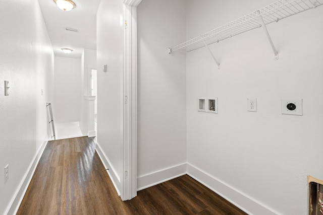 laundry area with hookup for an electric dryer, dark wood-type flooring, hookup for a washing machine, and baseboards