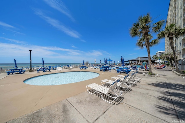 5801 Thomas Dr Unit 620, Panama City Beach, FL 32408 - pool with a water view and a patio area