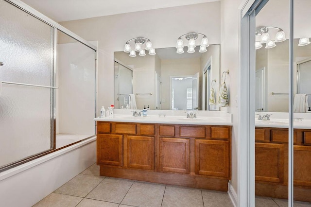 1901 Cottage Grove Ln Unit 1, Niceville, FL 32578 - full bathroom featuring double vanity, tile patterned floors, enclosed tub / shower combo, and a chandelier