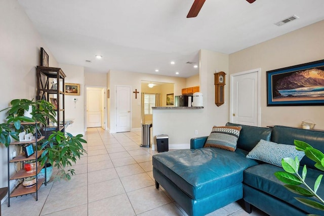 1901 Cottage Grove Ln Unit 1, Niceville, FL 32578 - living room with ceiling fan, light tile patterned floors, recessed lighting, and baseboards
