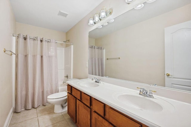 1901 Cottage Grove Ln Unit 1, Niceville, FL 32578 - bathroom featuring tile patterned floors, double vanity, toilet, and shower / bath combo with shower curtain