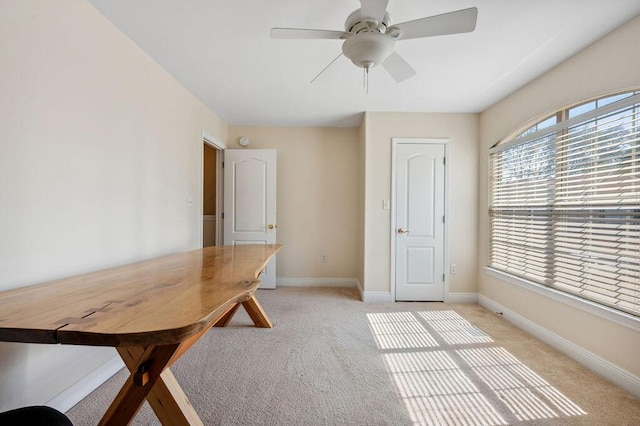 1901 Cottage Grove Ln Unit 1, Niceville, FL 32578 - unfurnished dining area featuring light colored carpet, baseboards, and ceiling fan