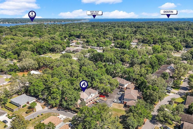 1901 Cottage Grove Ln Unit 1, Niceville, FL 32578 - aerial perspective of suburban area with a forest and a nearby body of water