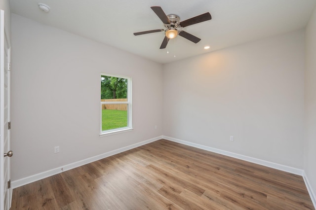 unfurnished room featuring light wood-style flooring, baseboards, ceiling fan, and recessed lighting