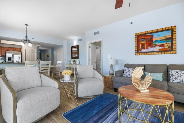 112 Seascape Dr Unit 310, Miramar Beach, FL 32550 - living room with wood finished floors and a ceiling fan
