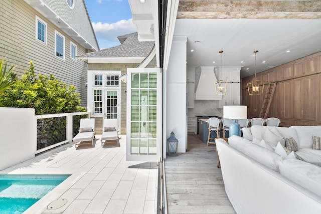 28 Rainer Ln, Inlet Beach, FL 32461 - wooden deck featuring an outdoor hangout area and an outdoor pool