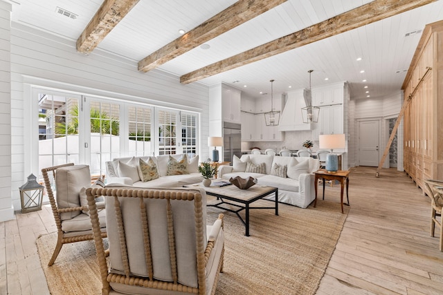 28 Rainer Ln, Inlet Beach, FL 32461 - living room featuring recessed lighting, visible vents, stairs, light wood-style floors, and beam ceiling