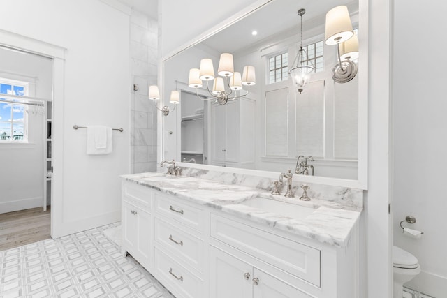 28 Rainer Ln, Inlet Beach, FL 32461 - bathroom featuring tile patterned floors, a chandelier, double vanity, and a sink
