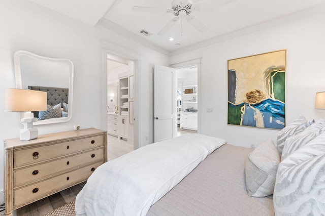 28 Rainer Ln, Inlet Beach, FL 32461 - bedroom with connected bathroom, a ceiling fan, visible vents, and wood finished floors