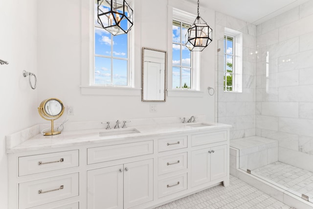 28 Rainer Ln, Inlet Beach, FL 32461 - full bath featuring a sink, double vanity, tiled shower, and tile patterned floors