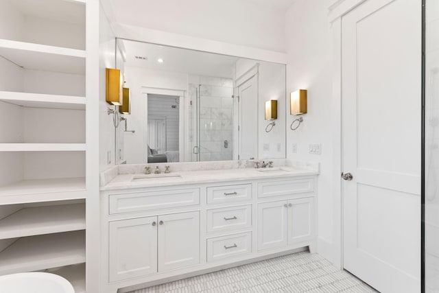 28 Rainer Ln, Inlet Beach, FL 32461 - ensuite bathroom with a stall shower, tile patterned flooring, double vanity, and a sink