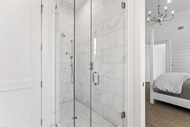 28 Rainer Ln, Inlet Beach, FL 32461 - full bath with ensuite bath, a chandelier, a shower stall, and visible vents