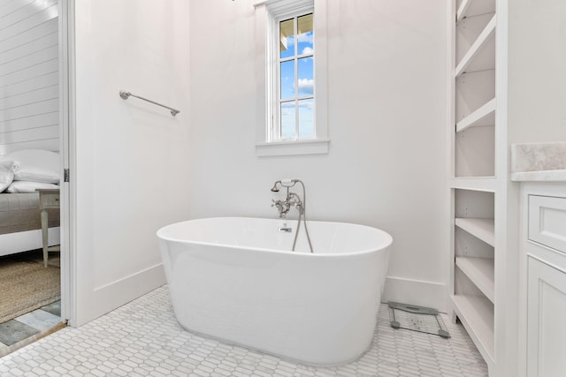 28 Rainer Ln, Inlet Beach, FL 32461 - full bathroom featuring a soaking tub, baseboards, and built in features