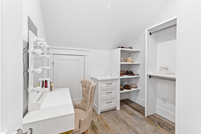 28 Rainer Ln, Inlet Beach, FL 32461 - walk in closet featuring light wood-type flooring and vaulted ceiling