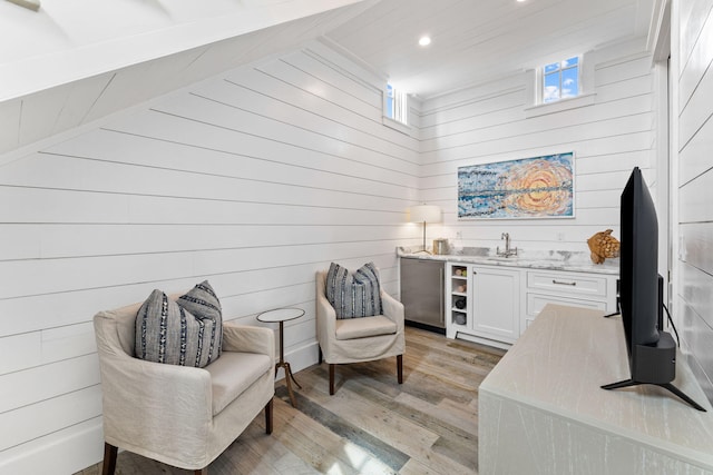 28 Rainer Ln, Inlet Beach, FL 32461 - living area with wood ceiling, light wood-style flooring, wood walls, wet bar, and recessed lighting