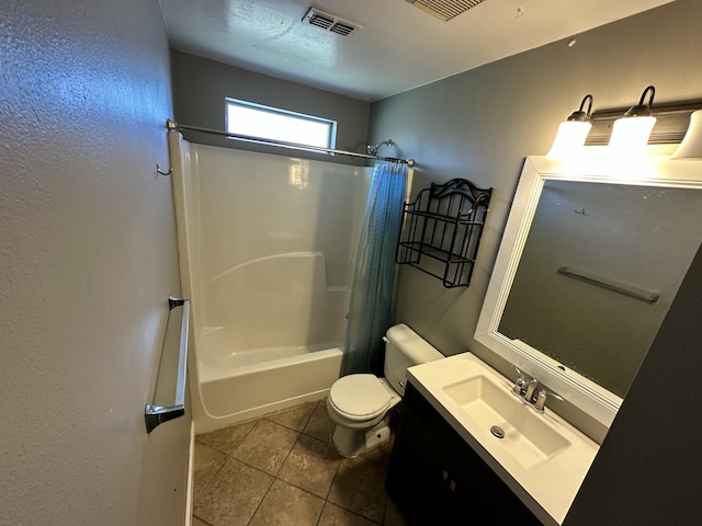 bathroom featuring shower / bath combo, vanity, toilet, tile patterned floors, and visible vents