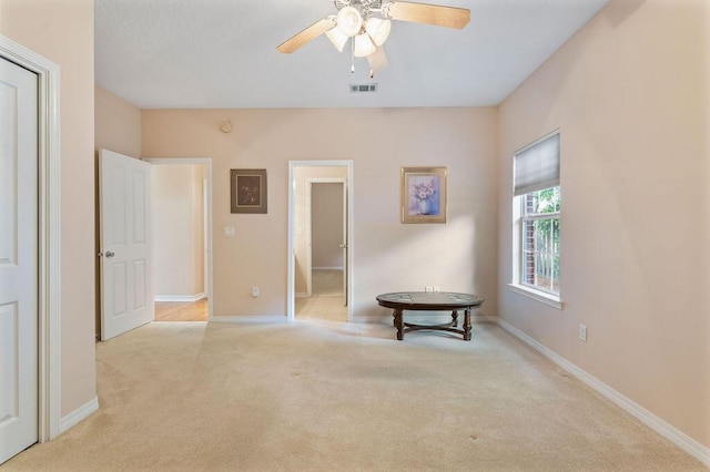 bedroom with carpet, baseboards, and a ceiling fan