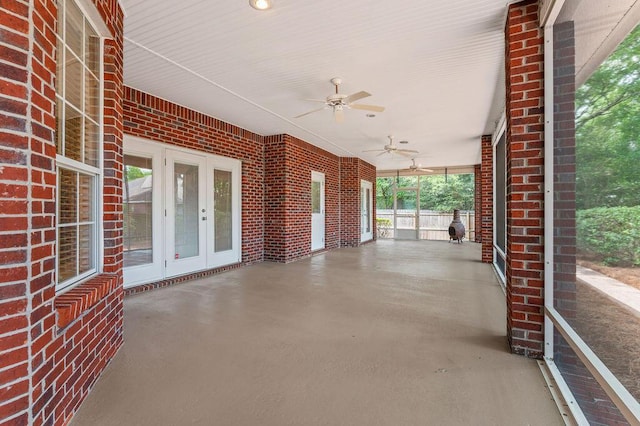 view of patio with french doors and ceiling fan