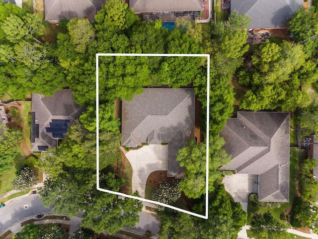 aerial view of residential area with property boundaries highlighted