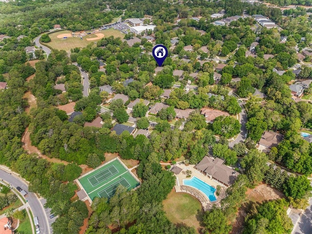 aerial overview of property's location with a pool area