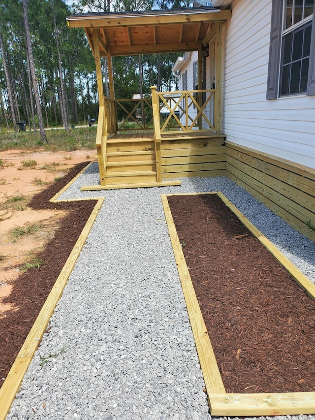 157 Pine Ln, Freeport, FL 32439 - view of yard featuring a wooden deck