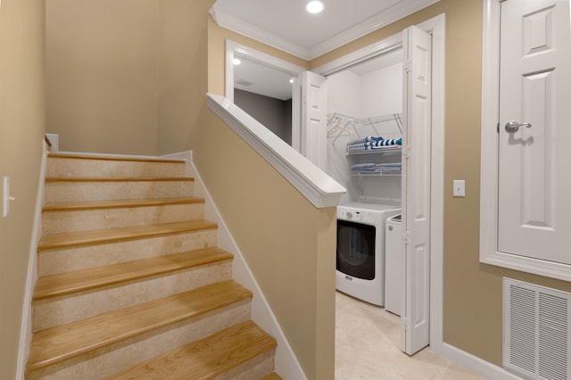 2021 Pine Island Cir, Miramar Beach, FL 32550 - staircase featuring visible vents, ornamental molding, baseboards, and washer and dryer