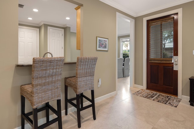 2021 Pine Island Cir, Miramar Beach, FL 32550 - dining space featuring crown molding, baseboards, recessed lighting, and visible vents