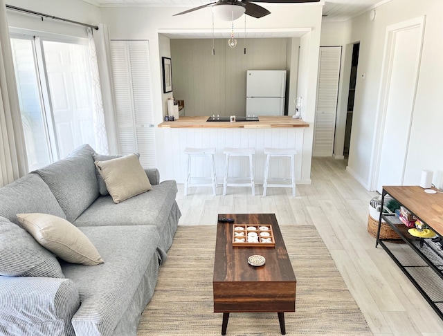 4000 Gulf Terrace Dr Unit 2001, Destin, FL 32541 - living room featuring light wood finished floors and ceiling fan