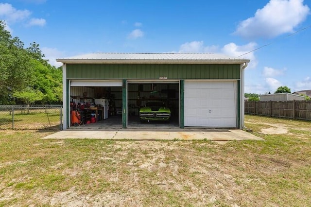 detached garage with fence