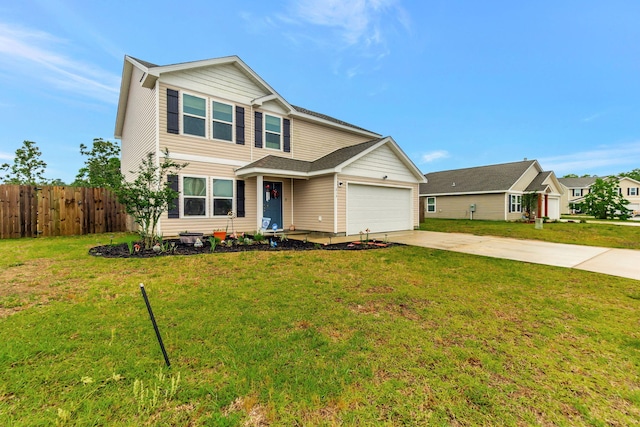 traditional home with fence, concrete driveway, a garage, and a front yard