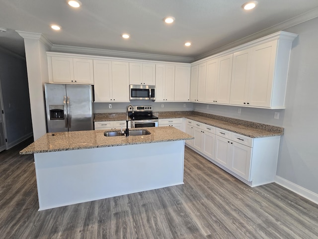 467 N County Highway 395, Santa Rosa Beach, FL 32459 - kitchen featuring a kitchen island with sink, appliances with stainless steel finishes, baseboards, white cabinets, and ornamental molding