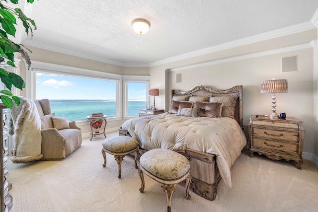 240 Gulf Shore Dr Unit 433, Destin, FL 32541 - bedroom featuring light colored carpet, a textured ceiling, a water view, ornamental molding, and baseboards