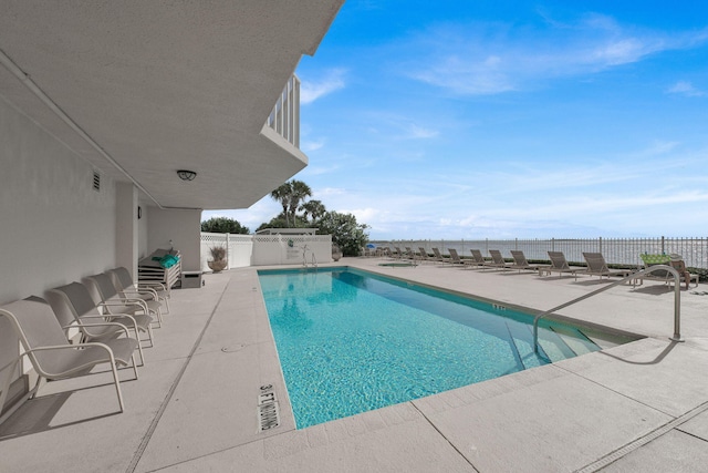 240 Gulf Shore Dr Unit 433, Destin, FL 32541 - community pool featuring a patio area