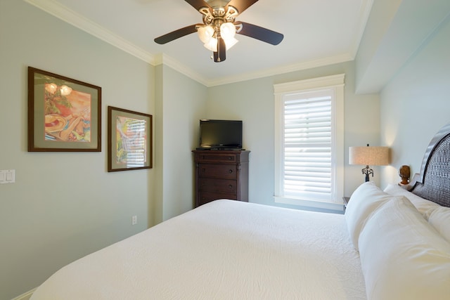 bedroom featuring ornamental molding and a ceiling fan
