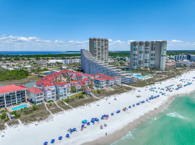 bird's eye view of waterfront with a beach
