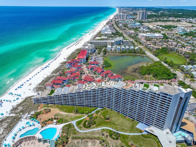 drone / aerial view of waterfront with a beach