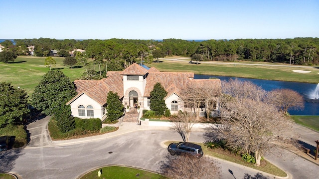 674 Emerald Bay Dr, Destin, FL 32541 - view of subject property with a nearby body of water, a golf course, and a heavily wooded area