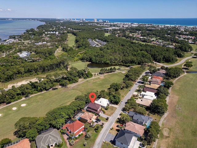 674 Emerald Bay Dr, Destin, FL 32541 - view of property location with a nearby body of water, a local golf course, nearby suburban area, and a tree filled landscape