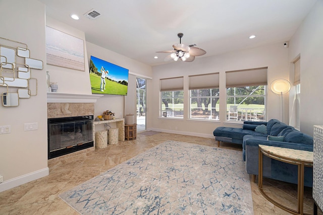 674 Emerald Bay Dr, Destin, FL 32541 - living room with ceiling fan, baseboards, a fireplace, and recessed lighting