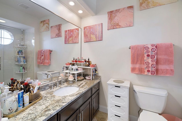 674 Emerald Bay Dr, Destin, FL 32541 - full bath with toilet, a shower stall, recessed lighting, vanity, and baseboards