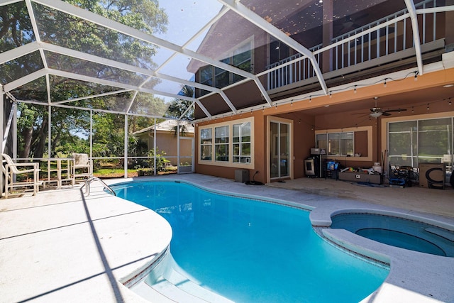 674 Emerald Bay Dr, Destin, FL 32541 - view of pool with a patio, a ceiling fan, a pool with connected hot tub, and glass enclosure