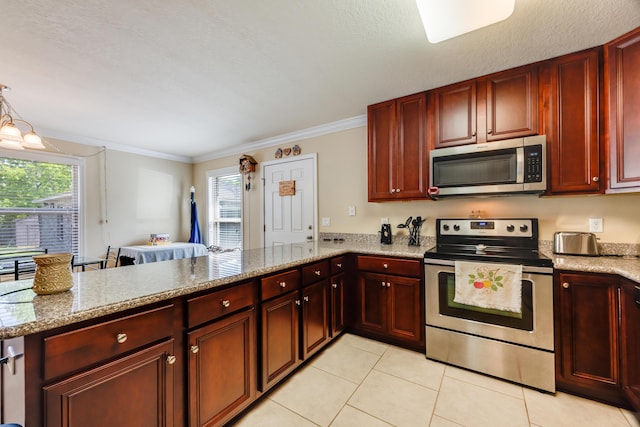 6444 Welannee Blvd, Laurel Hill, FL 32567 - kitchen featuring appliances with stainless steel finishes, dark brown cabinets, light tile patterned flooring, plenty of natural light, and crown molding