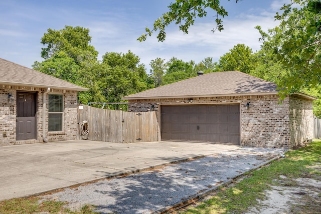 6444 Welannee Blvd, Laurel Hill, FL 32567 - garage with fence and driveway