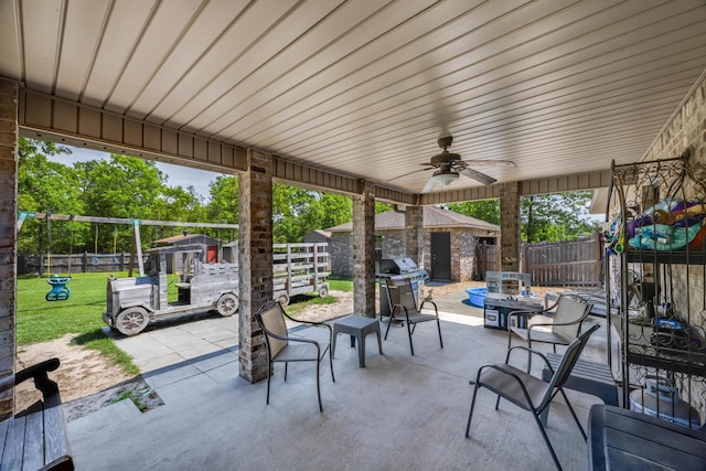 6444 Welannee Blvd, Laurel Hill, FL 32567 - view of patio with an outbuilding, a grill, a storage unit, and ceiling fan