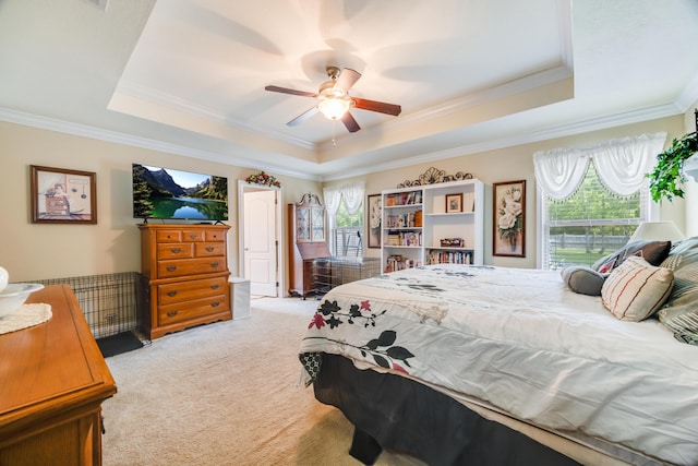 6444 Welannee Blvd, Laurel Hill, FL 32567 - bedroom with a tray ceiling, crown molding, light carpet, and a ceiling fan
