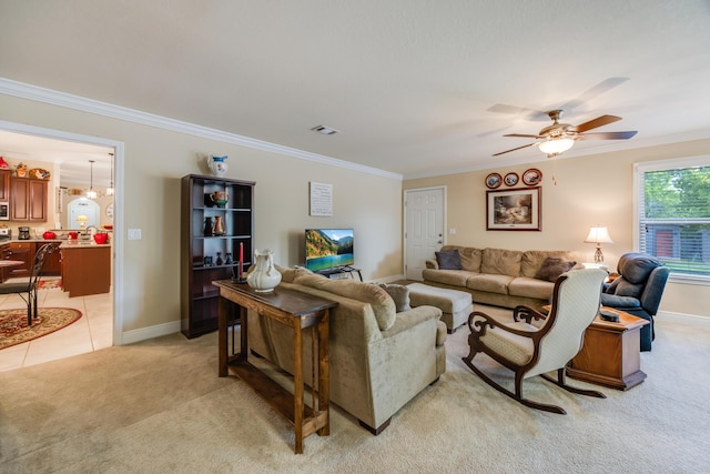 6444 Welannee Blvd, Laurel Hill, FL 32567 - living room featuring light colored carpet, ornamental molding, baseboards, and ceiling fan
