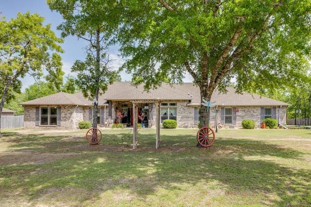 6444 Welannee Blvd, Laurel Hill, FL 32567 - rear view of property featuring brick siding and roof with shingles